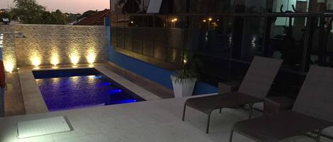 Outdoor pool, sun loungers