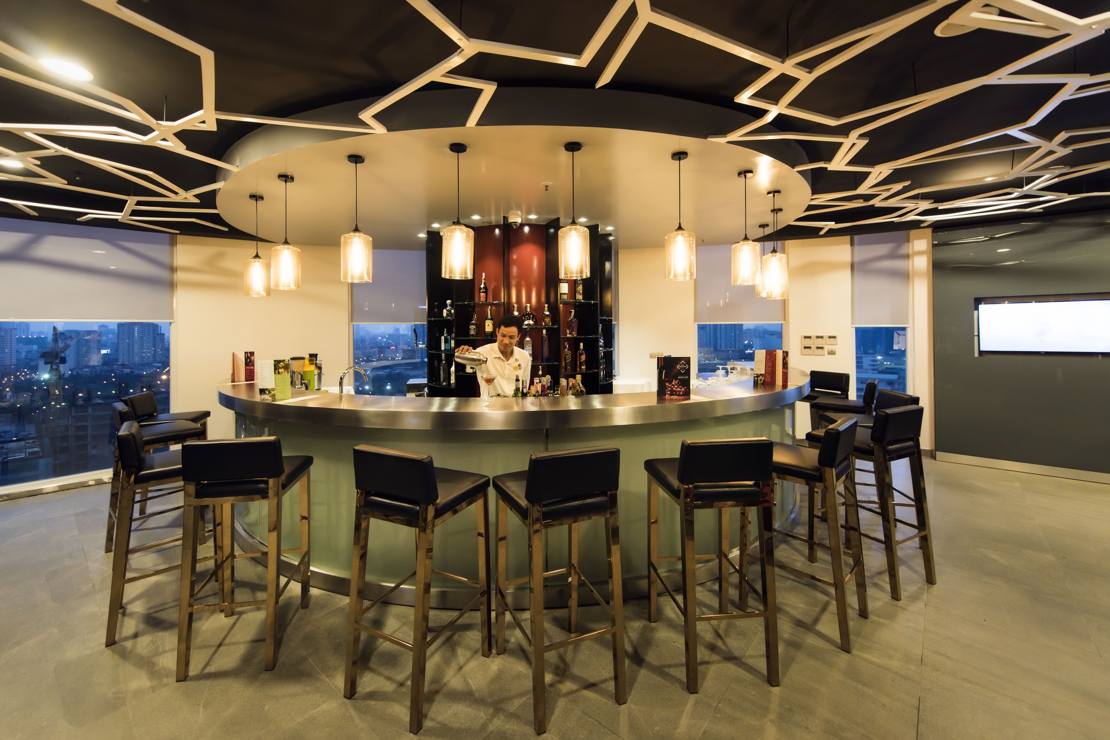 3 bars/lounges, rooftop bar, lobby lounge