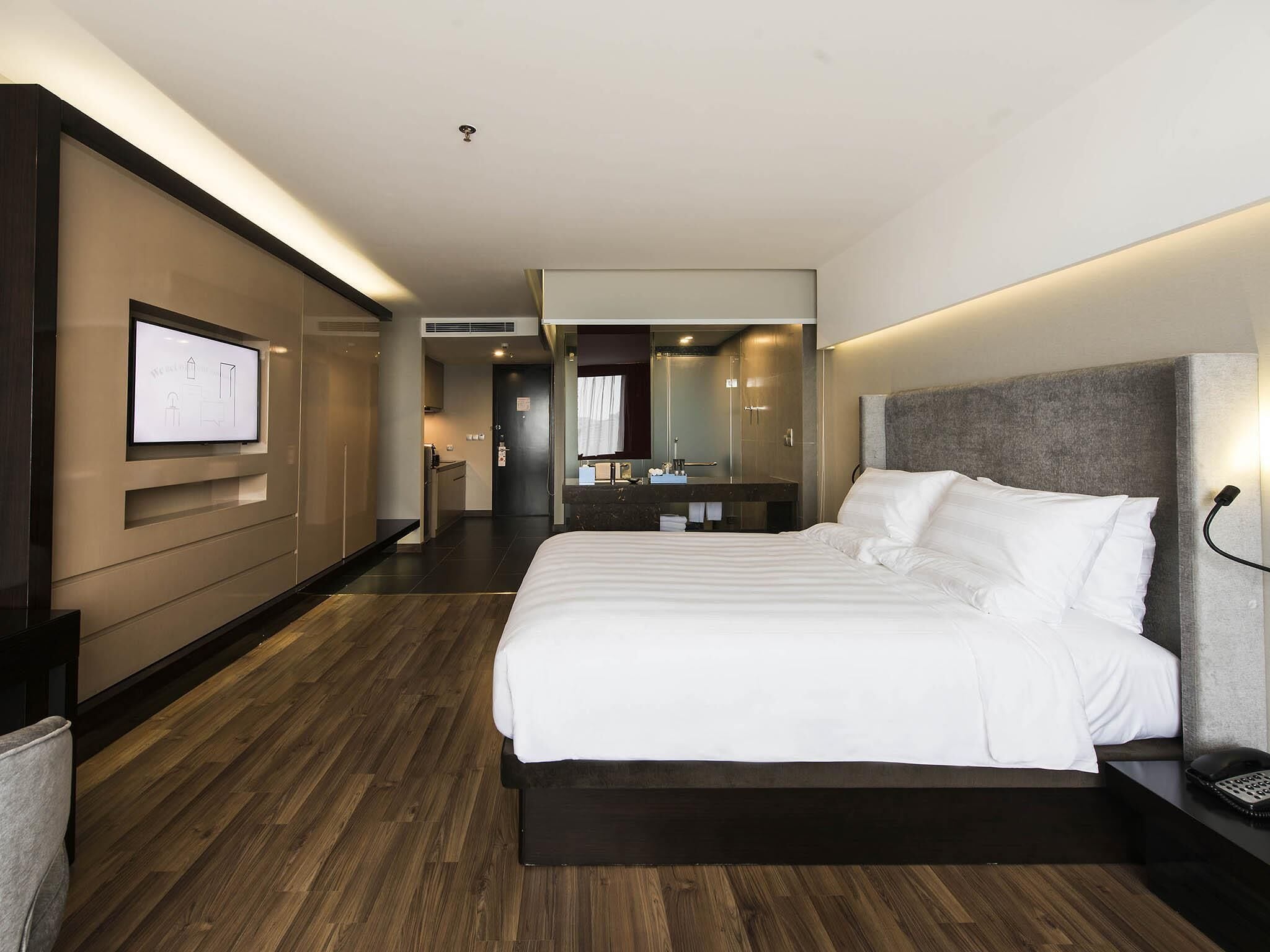 Hypo-allergenic bedding, free minibar items, in-room safe, desk