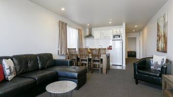 Superior 2 bedroom Apartment with lake view (Acacia wing) | Living room | 50-inch LCD TV with cable channels, TV