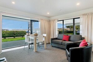 2 Bedroom downstairs, Lake view Suite (Acacia Wing) | Living area | 50-inch LCD TV with cable channels, TV - Acacia Lake View Motel (Taupo)