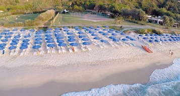 Private beach, sun loungers, beach umbrellas, beach volleyball