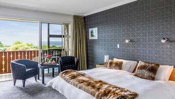 Luxury Suite, 1 King Bed, Private Bathroom, Partial Lake View | 1 bedroom, Egyptian cotton sheets, premium bedding, down comforters