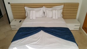 Premium bedding, in-room safe, blackout drapes, soundproofing