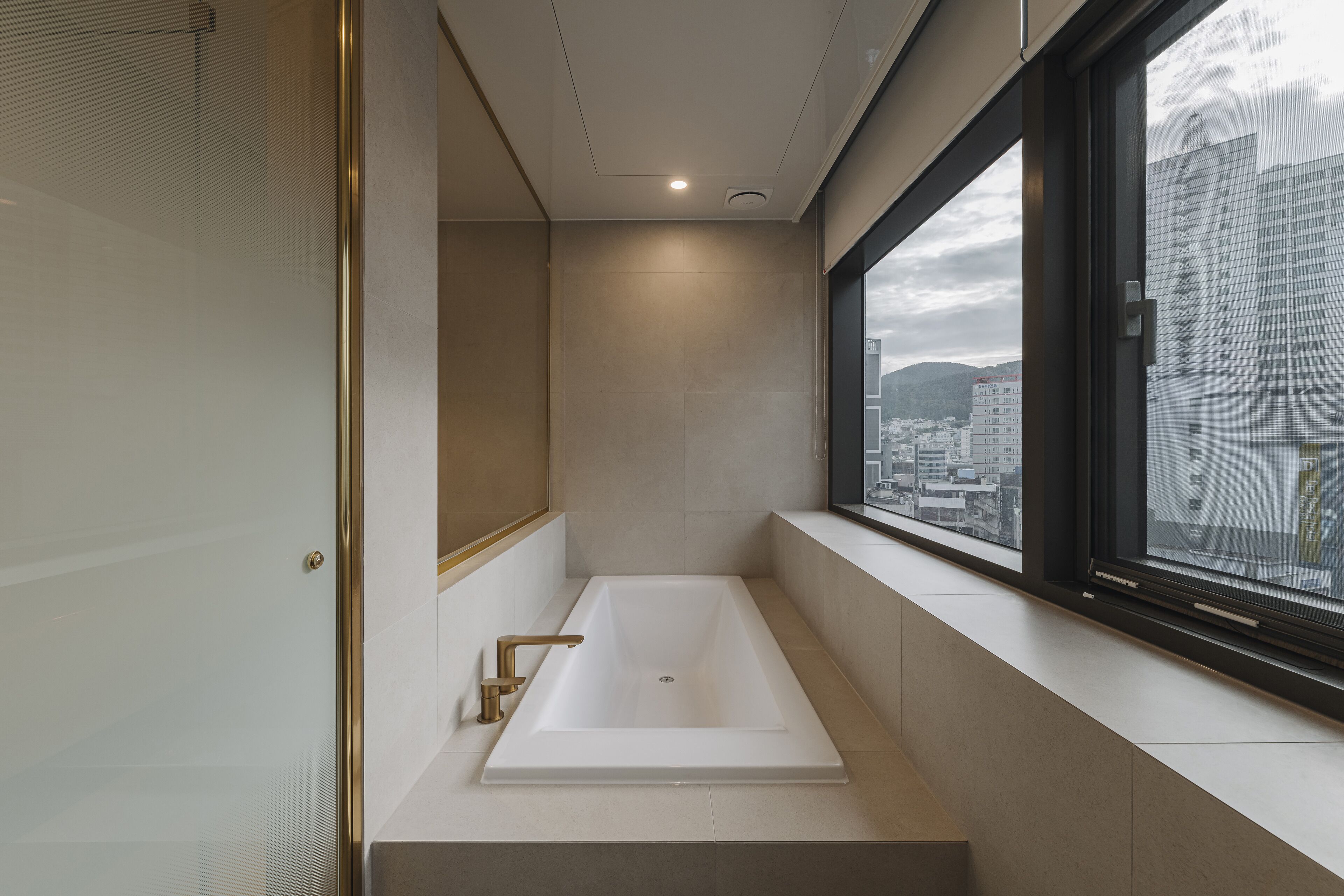 modern deluxe double | bathroom | shower, rainfall showerhead, hair dryer, bathrobes