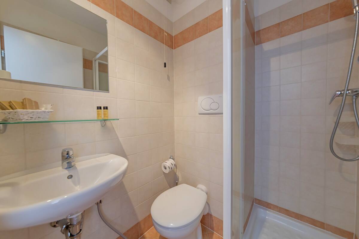 shower, free toiletries, hair dryer, bathrobes