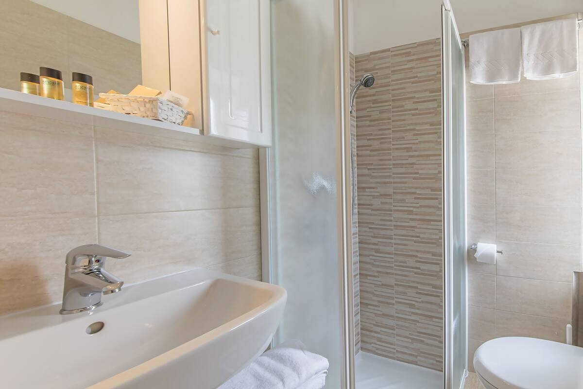 shower, free toiletries, hair dryer, bathrobes