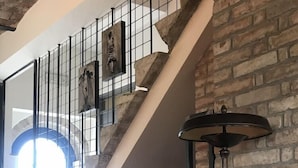 A reception area with a sign labeled "RECEPTION" on a wall.