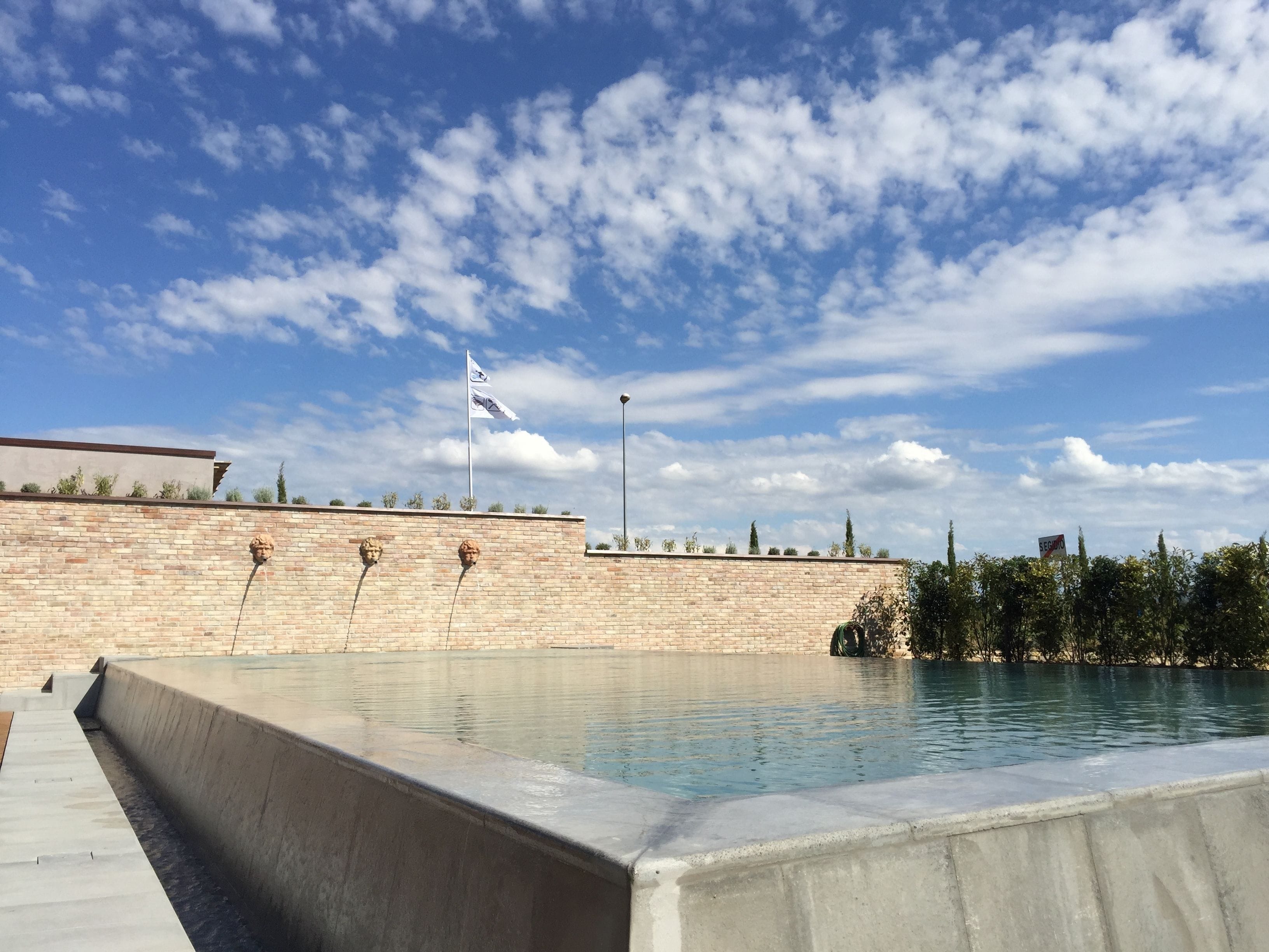 Outdoor pool, open 10:00 AM to 7:00 PM, pool umbrellas, sun loungers