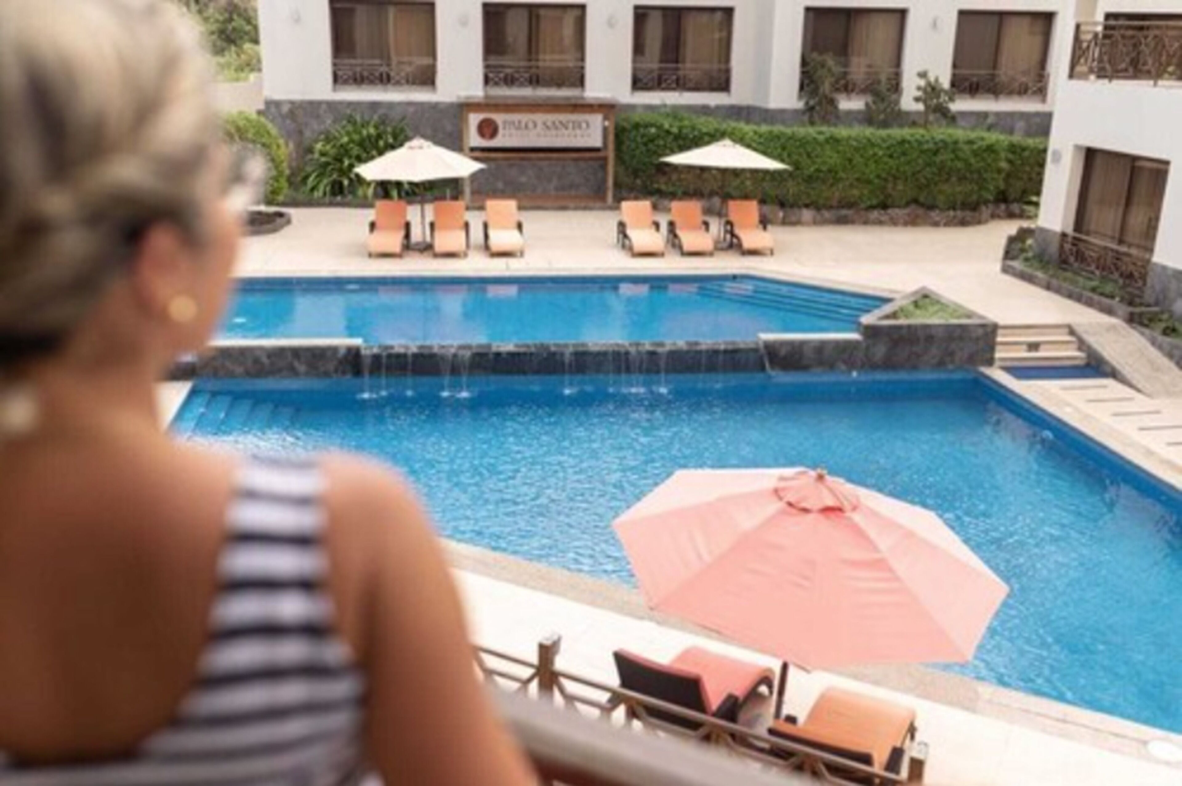 outdoor pool, pool umbrellas, pool loungers