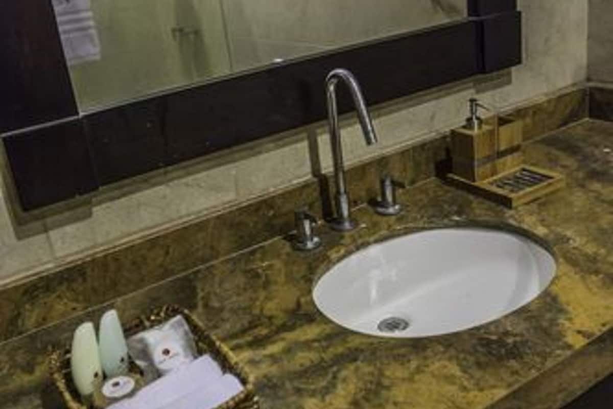 shower, rainfall showerhead, hair dryer, towels