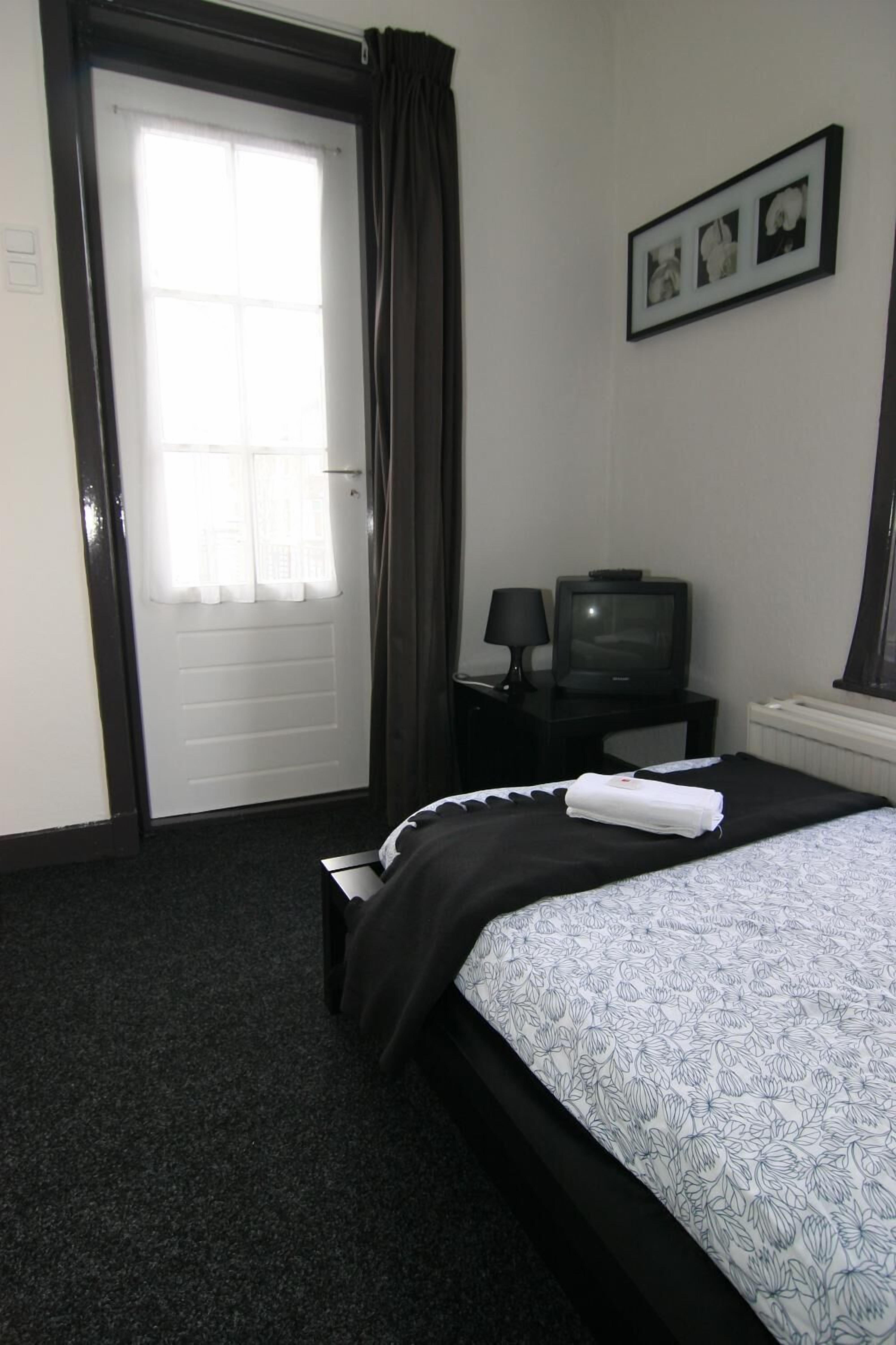desk, cots/infant beds, free wifi, bed sheets