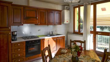 Comfort Apartment, 2 Bedrooms | Living area | Flat-screen TV