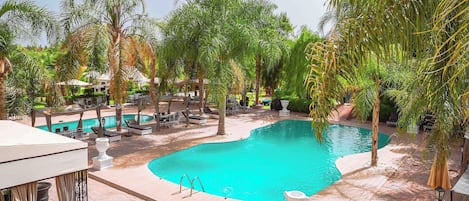 Outdoor pool, pool umbrellas, sun loungers
