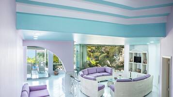 Family Townhome | Living area | 42-inch LCD TV with cable channels, TV