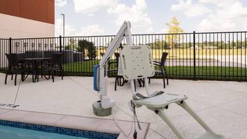 Seasonal outdoor pool, open 11 AM to 10 PM, pool loungers