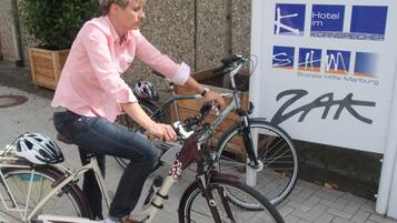 A person riding a stationary bike.