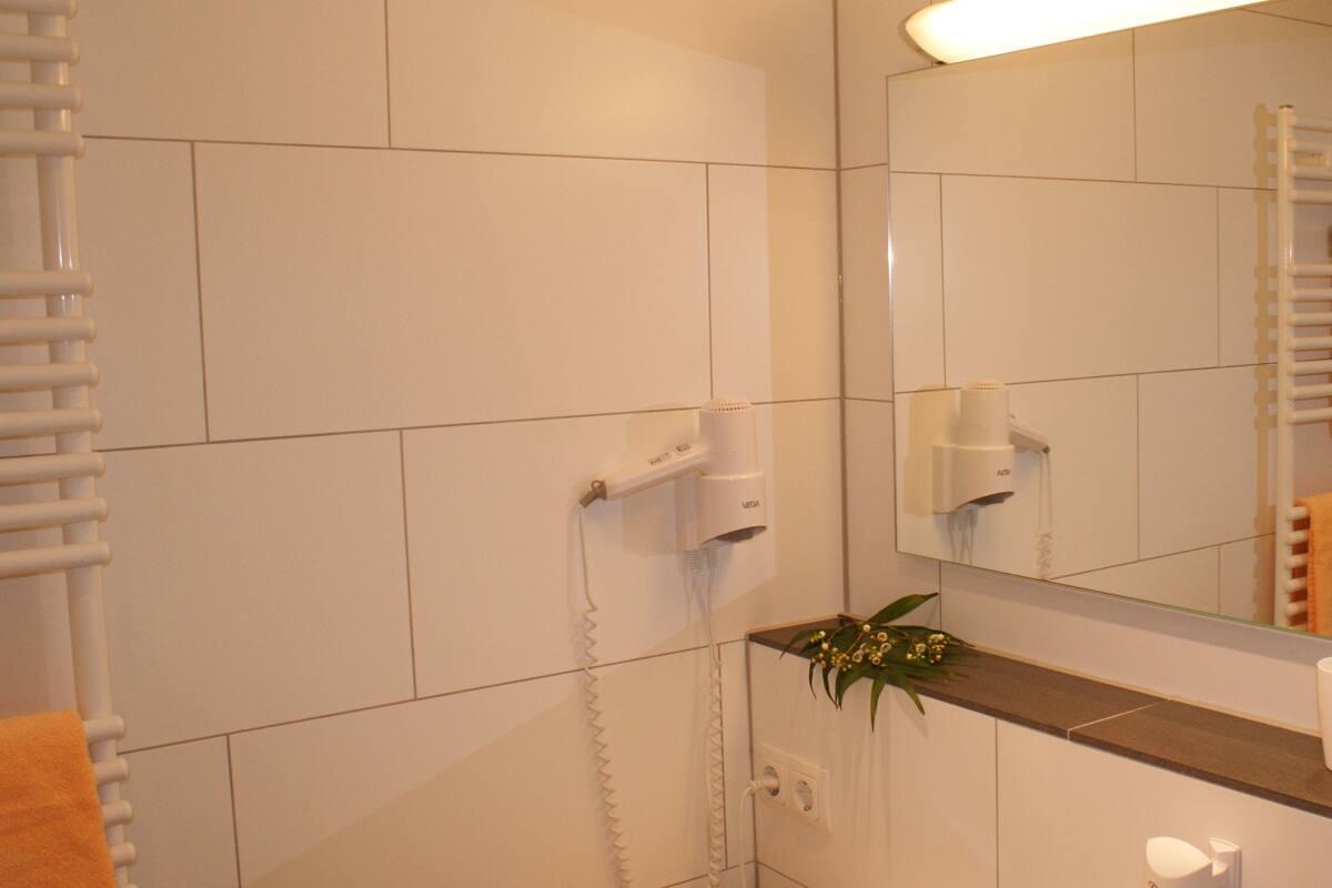 apartment | bathroom | shower, hair dryer, towels