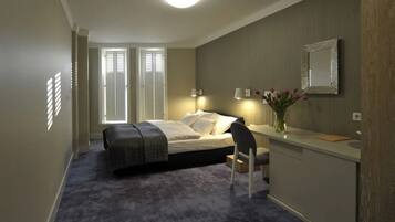 A bedroom with a bed, bedside table, chair, and a desk with a mirror.