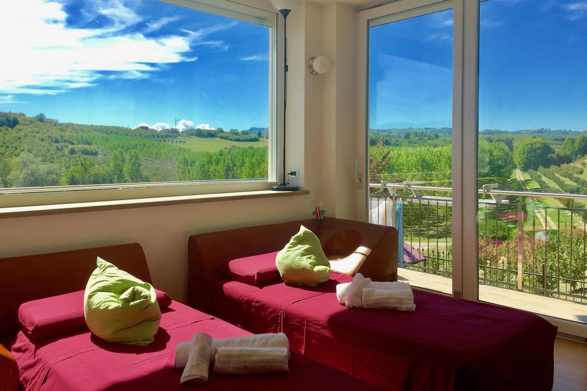 Suite ejecutiva, varias habitaciones, accesible para personas con discapacidad (Dolcetto) | 1 dormitorio, ropa de cama de alta calidad, colchones viscoelásticos