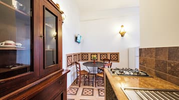 Superior Apartment, Multiple Beds, Air conditioning | Living area | Flat-screen TV