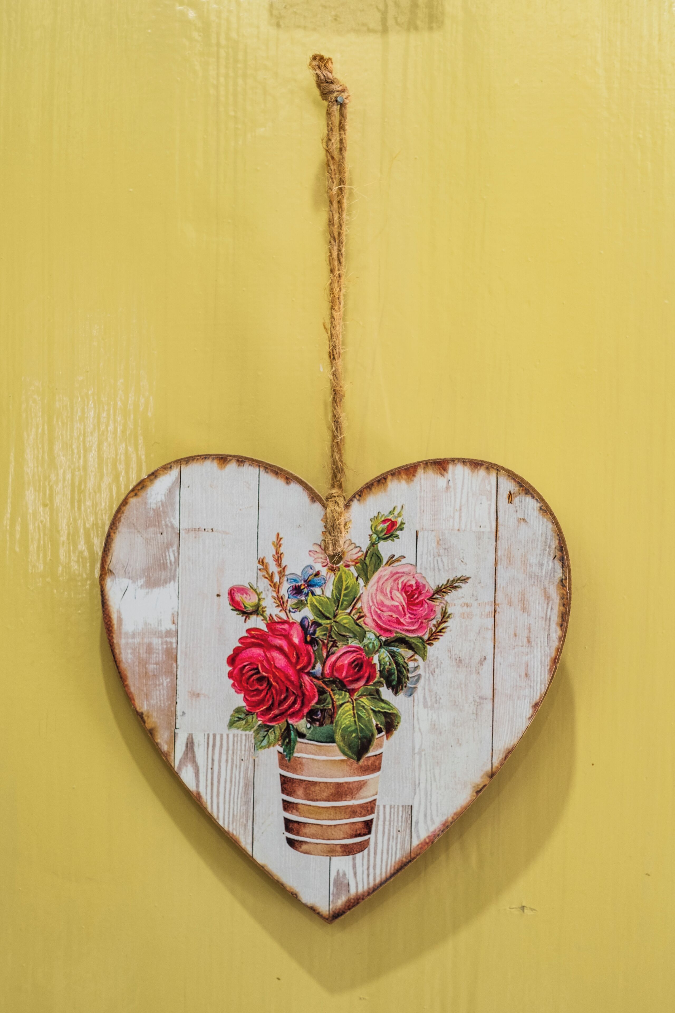 A heart-shaped decoration with a floral arrangement.