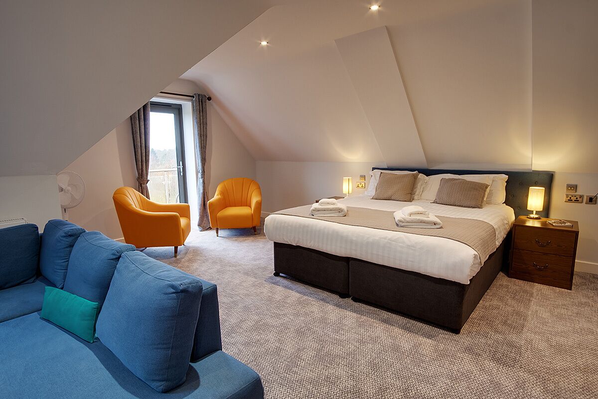 junior suite, golf view | premium bedding, in-room safe, iron/ironing board, free wifi