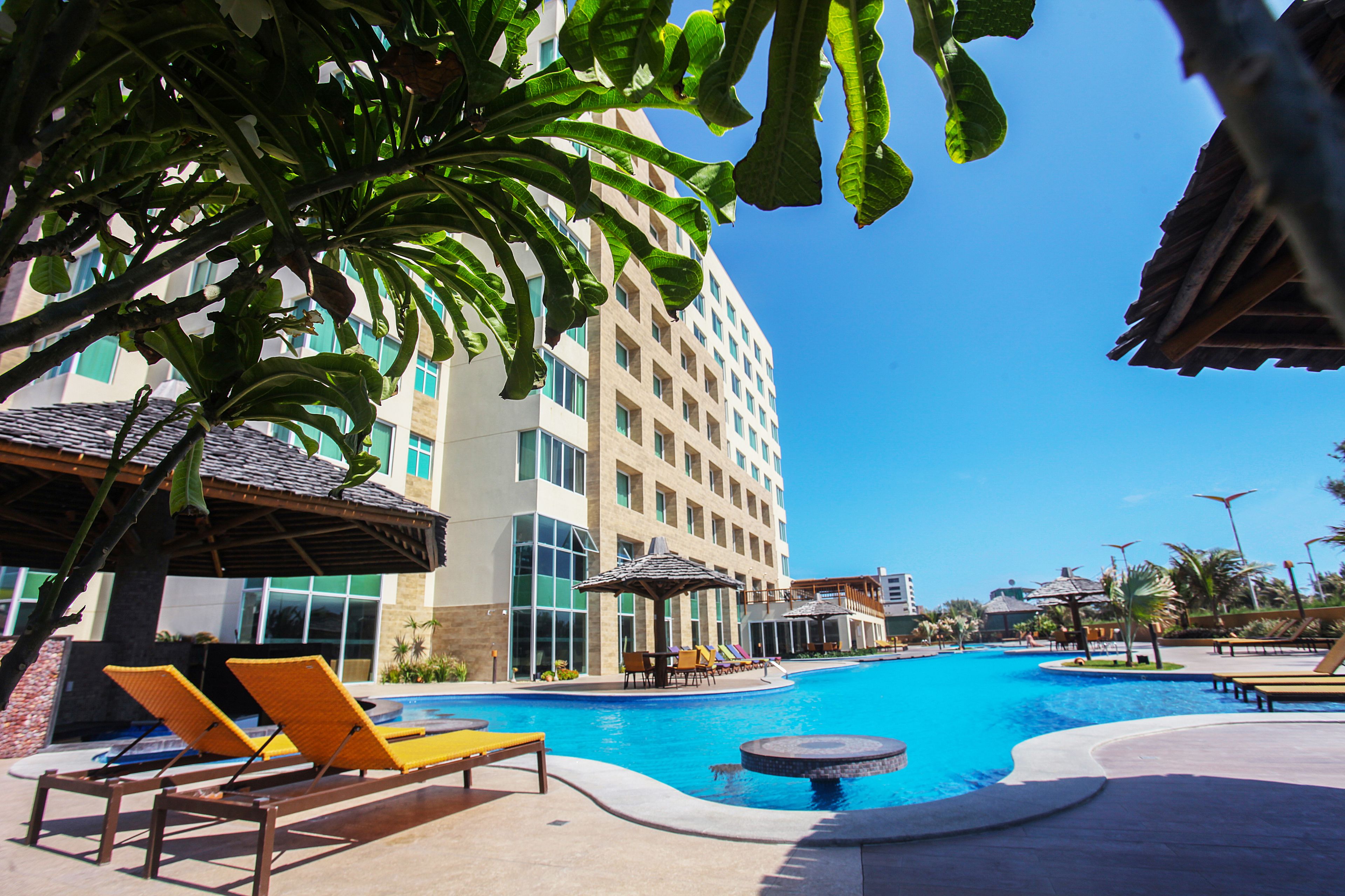 Outdoor pool, pool umbrellas, sun loungers