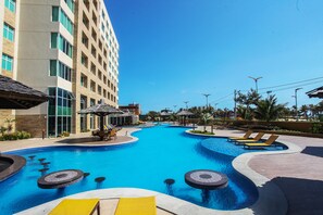 Outdoor pool, pool umbrellas, pool loungers