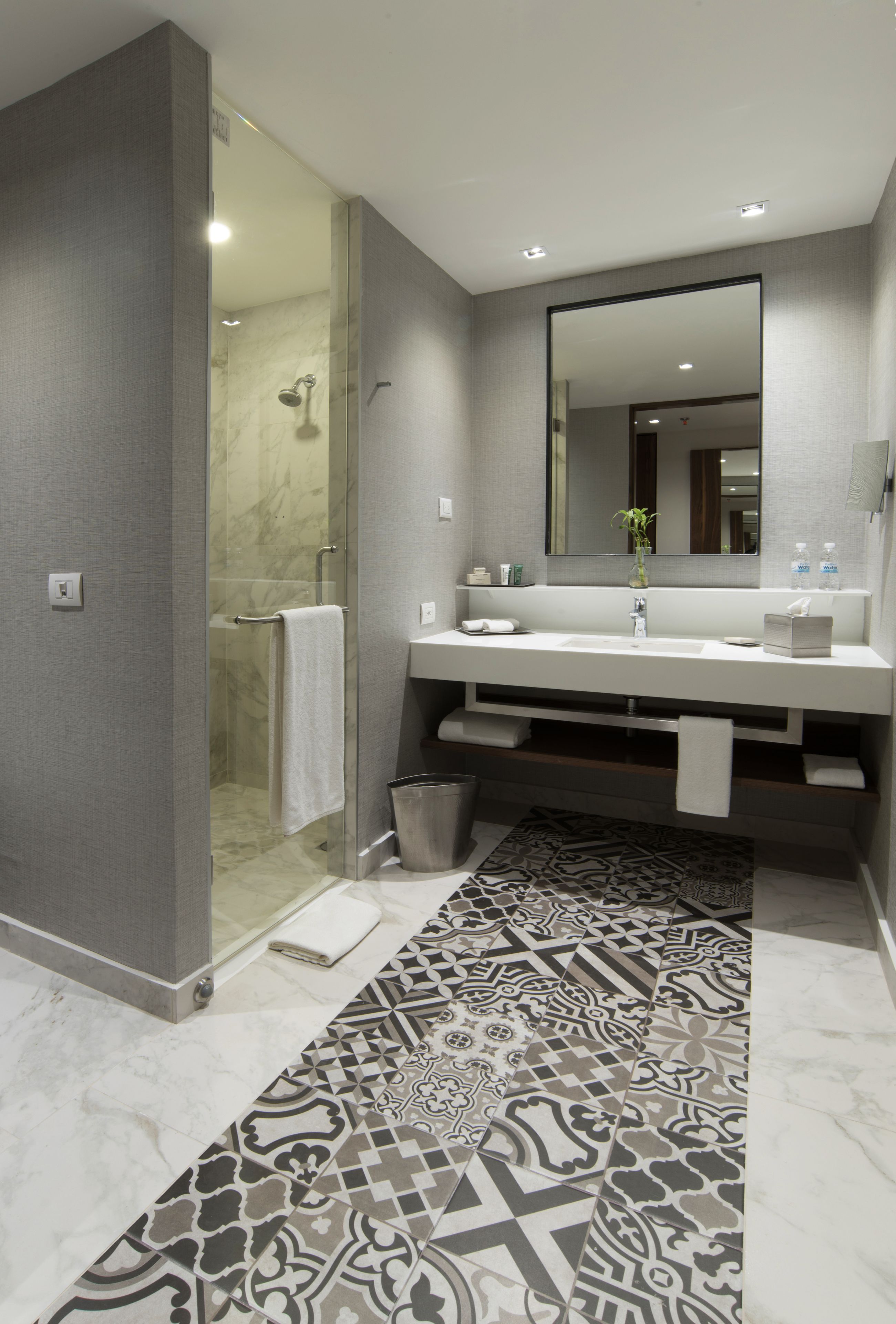junior suite, 2 double beds | bathroom | shower, eco-friendly toiletries, hair dryer, towels