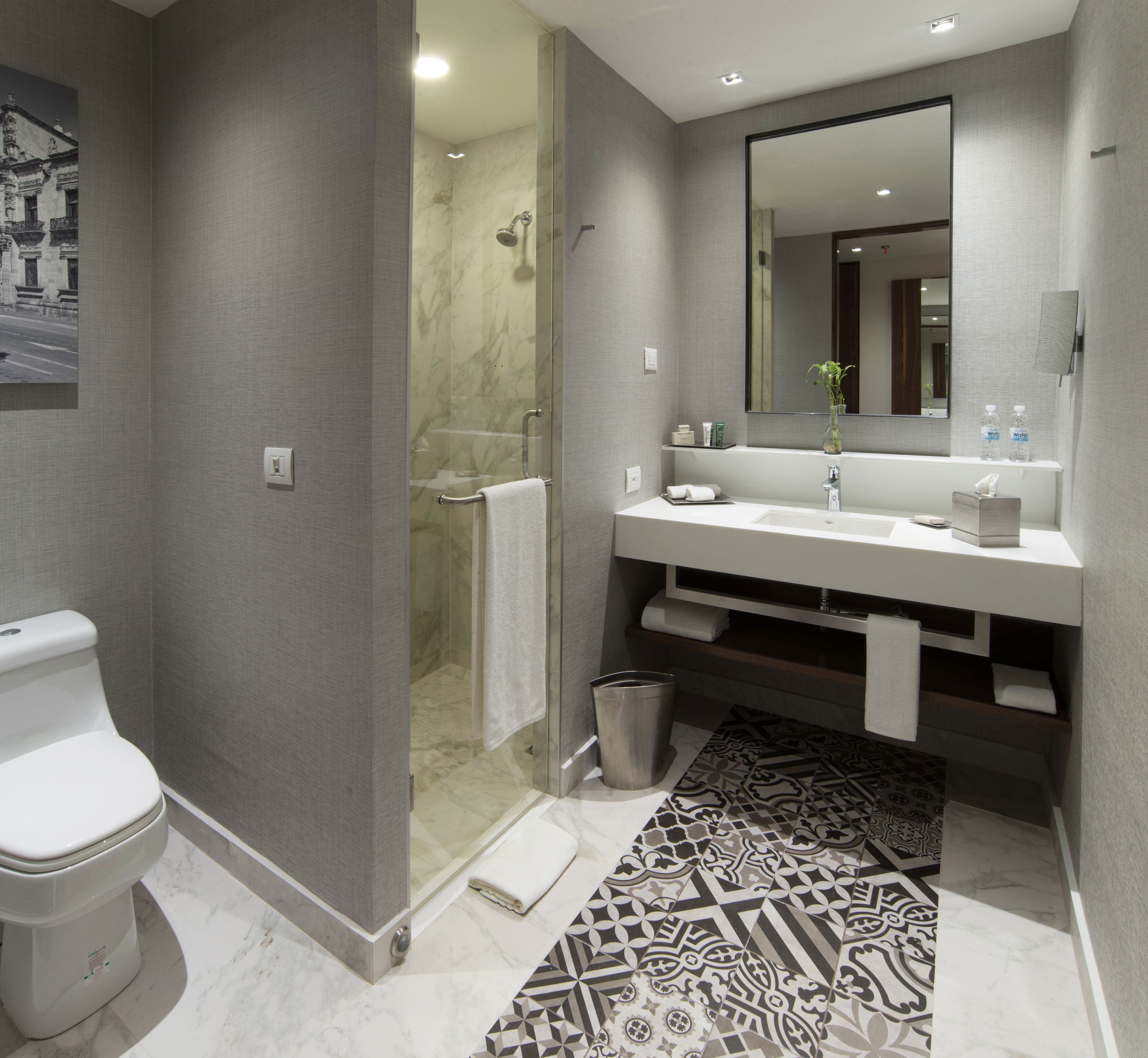 shower, eco-friendly toiletries, hair dryer, towels