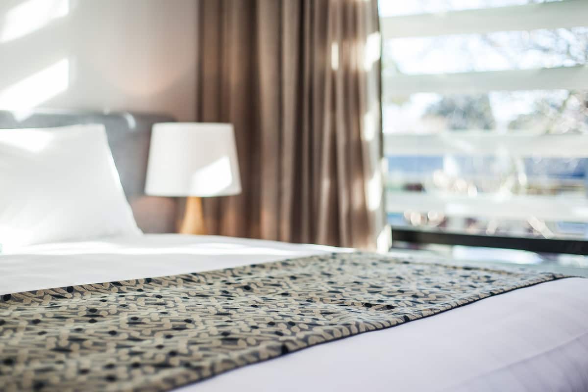 Premium bedding, desk, blackout curtains, soundproofing