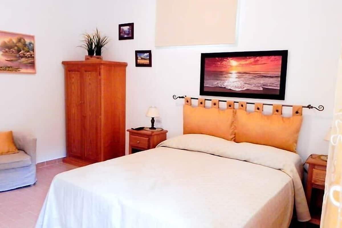 Kamer, 1 twee- of 2 eenpersoonsbedden, uitzicht op tuin | Gratis babybedden, gratis wifi, beddengoed