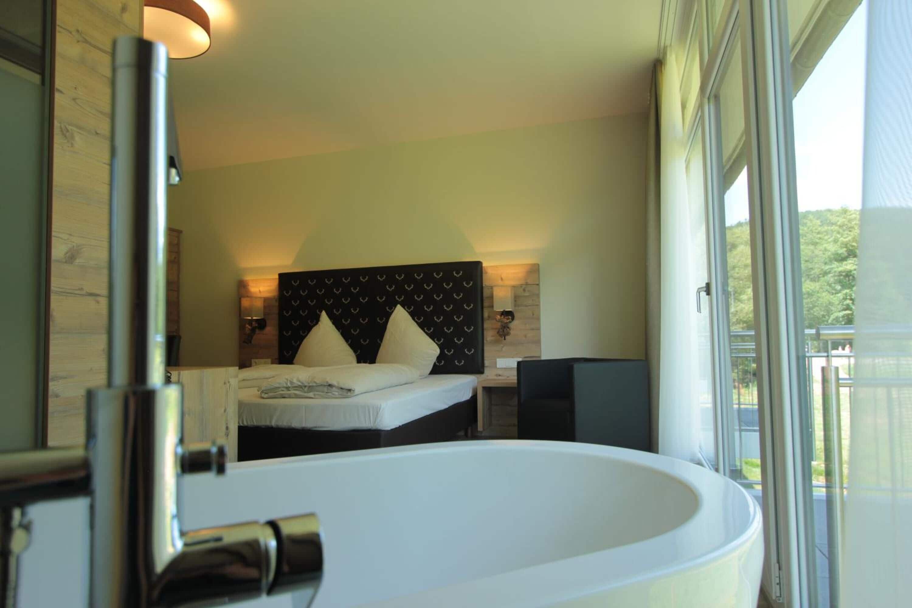 hypo-allergenic bedding, in-room safe, desk, blackout curtains