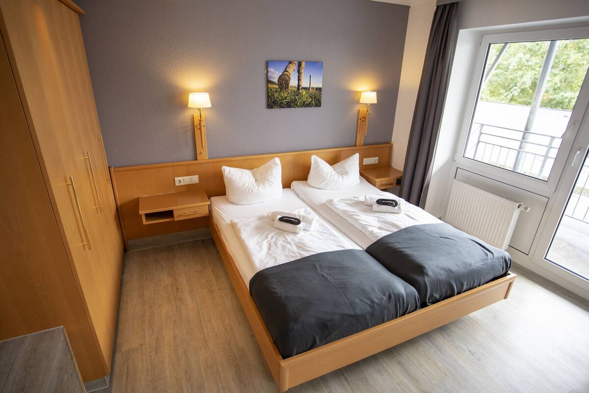 Hypo-allergenic bedding available, desk, blackout drapes, WiFi (free)