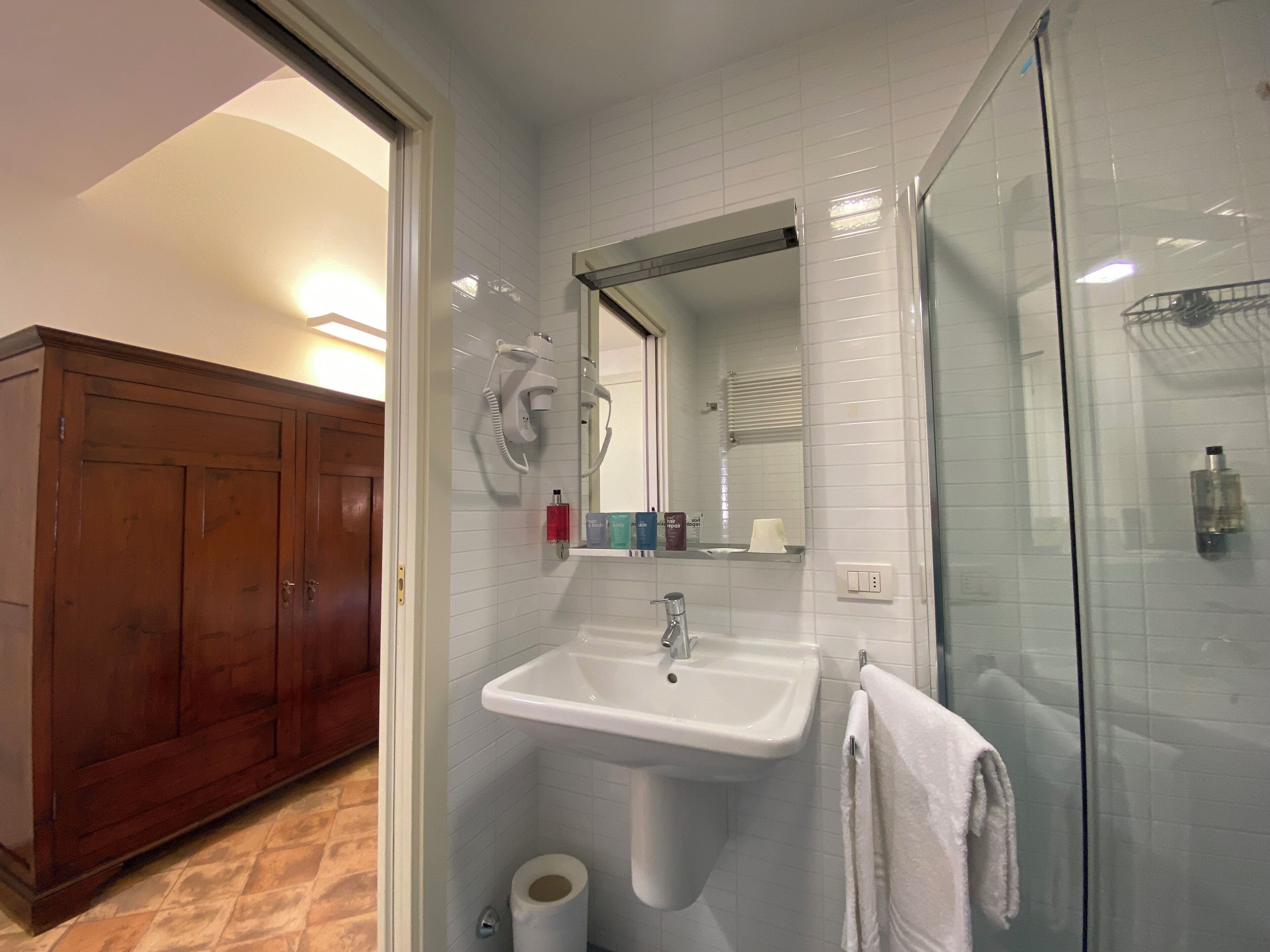 classic room | bathroom | shower, rainfall showerhead, free toiletries, hair dryer