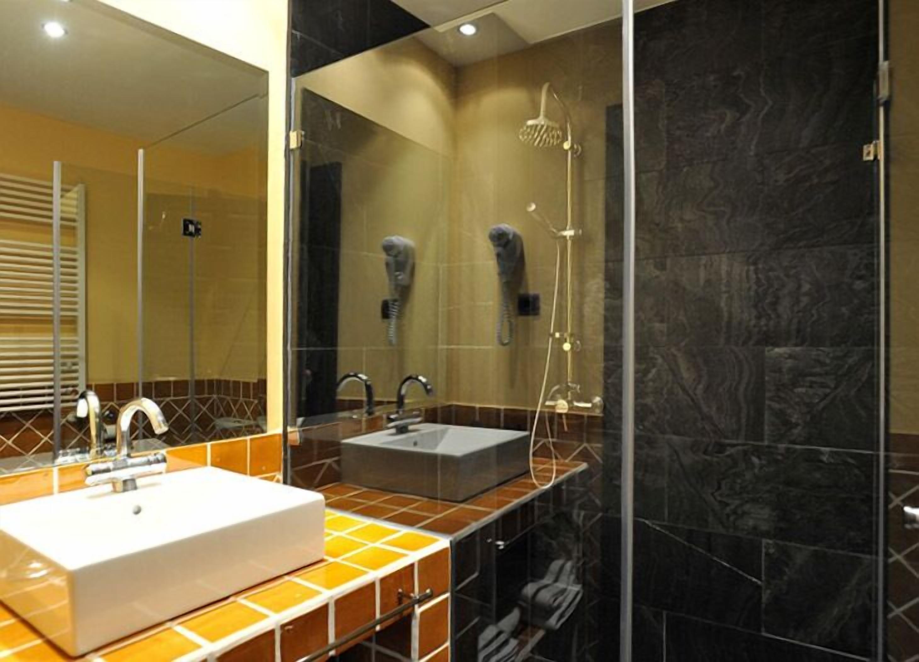 double or twin room | bathroom | deep-soaking bathtub, free toiletries, hair dryer, bidet