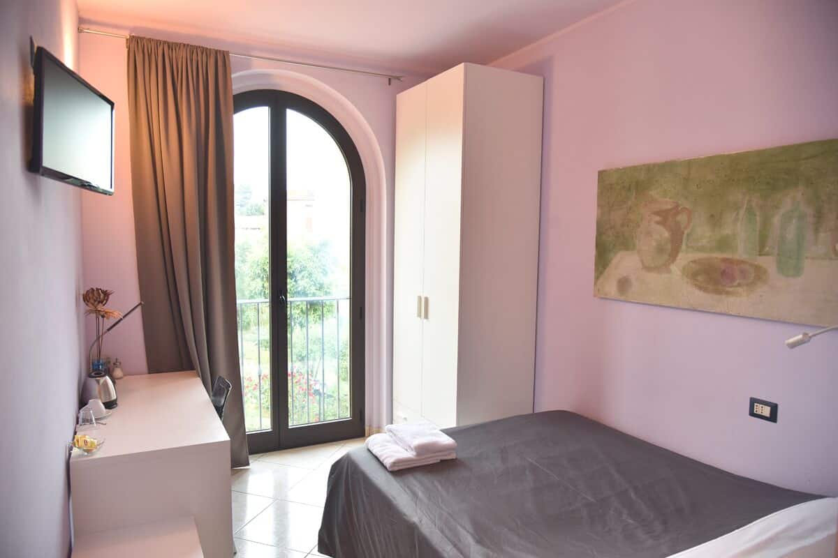 Economy Double Room, 1 Double Bed, Refrigerator, Garden View | Desk, laptop workspace, blackout curtains, soundproofing