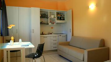 Chambre Familiale, coin cuisine, vue jardin