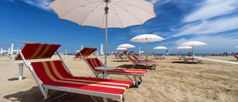 Sun loungers, beach umbrellas