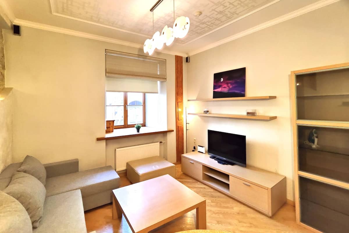 Standard Apartment | Living area | 32-inch LED TV with digital channels, TV