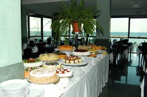 Breakfast, lunch, dinner served; local cuisine 