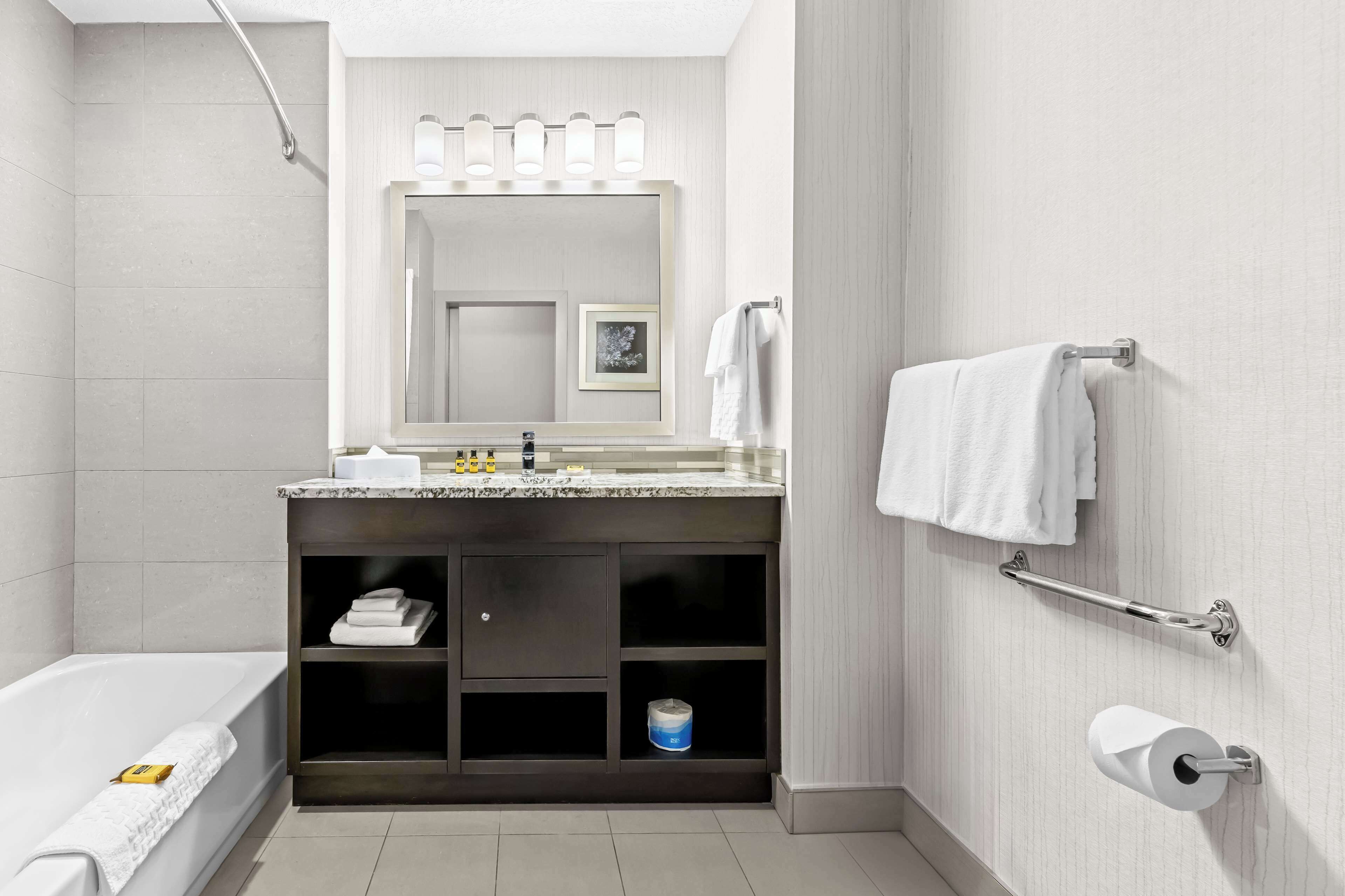 standard room, 2 queen beds, non smoking, kitchenette | bathroom | combined shower/bathtub, free toiletries, hair dryer, towels