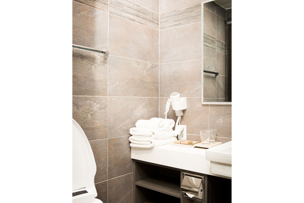 shower, free toiletries, hair dryer, dressing gowns