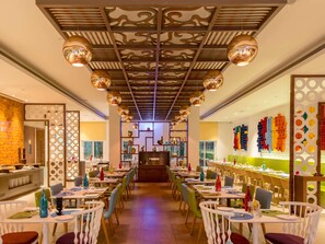 Breakfast, lunch, dinner served; international cuisine, pool views