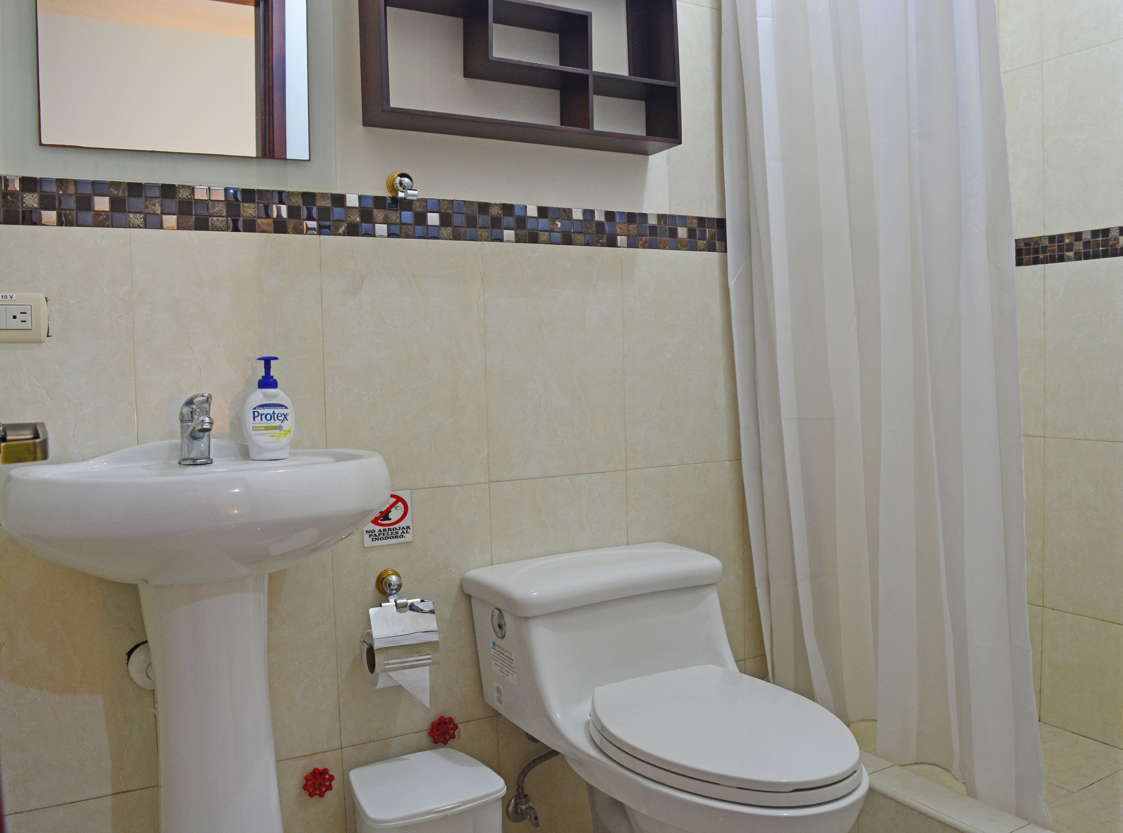 superior suite | bathroom | shower, free toiletries, hair dryer, towels