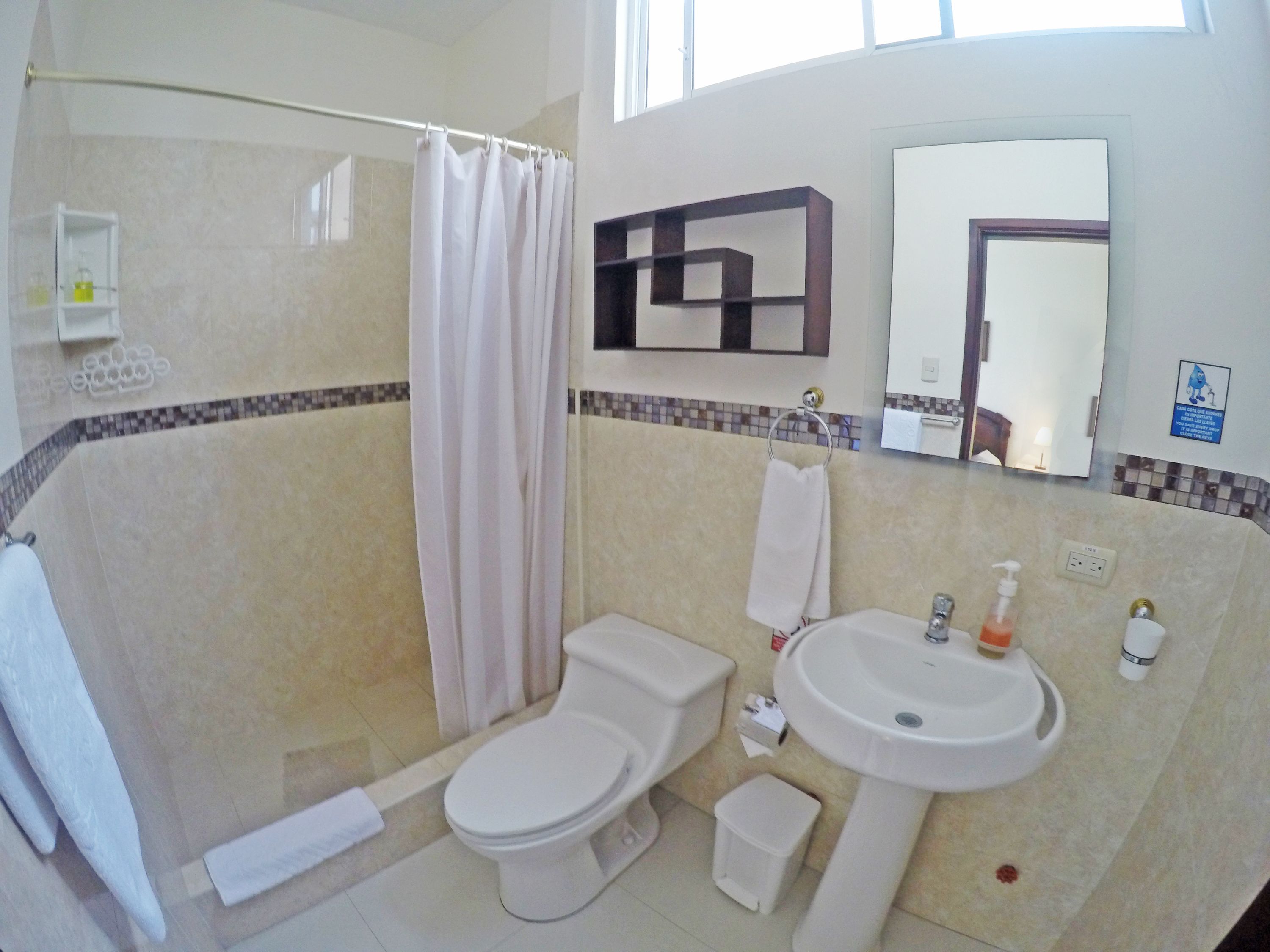 deluxe suite, balcony, city view | bathroom | shower, free toiletries, hair dryer, towels