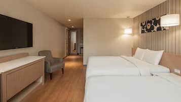 Elite Quadruple Room | Living area | 42-inch LCD TV with cable channels, TV