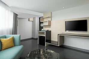 Chambre Premium, 1 grand lit | Coin séjour