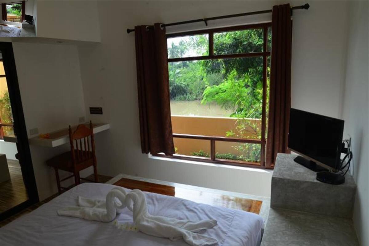 One-Bedroom House (Canal) | Escritorio, cortinas blackout, camas extra y wifi gratis